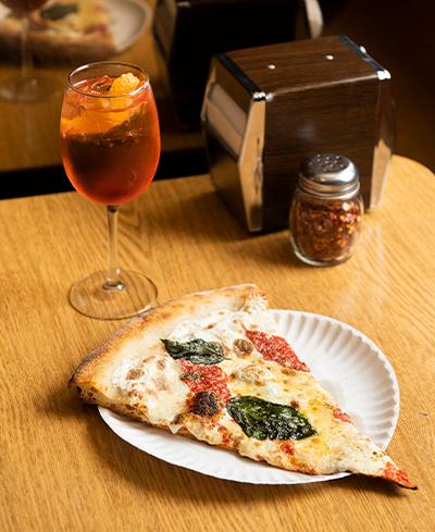 <h3>Scarr's</h3>
<p>An ‘80s pizza shop come to life and arguably the best pizza in the city, made with flour that’s milled in-house for the freshed flavor and incredible chew. Also: really good wine. </p>
<p><a href="/neighborhood-map#category_id=3&location_id=15" class="overlay-link">See on Map</a></p>